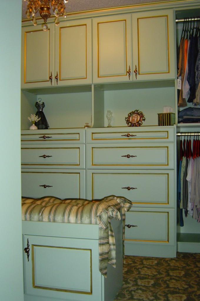 Gold edge detail painted on closet system furniture.