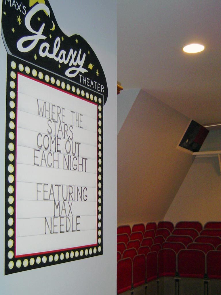 The name is added to the marquee in this movie theater-themed bedroom.