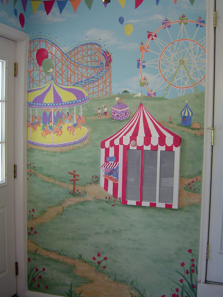 Amusement park themed mural painted in playroom, incorporating wall-mounted heating unit in design.