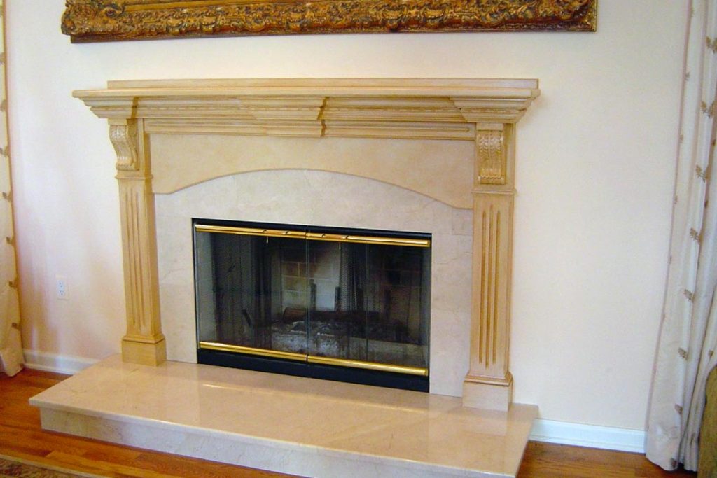 Antique glaze finish painted on fireplace mantel.