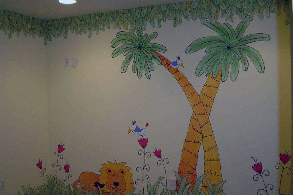 Cartoon-style mural in playroom.