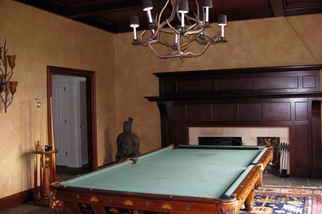 Glaze paint treatment over textured plaster wall finish in Billiards Room.