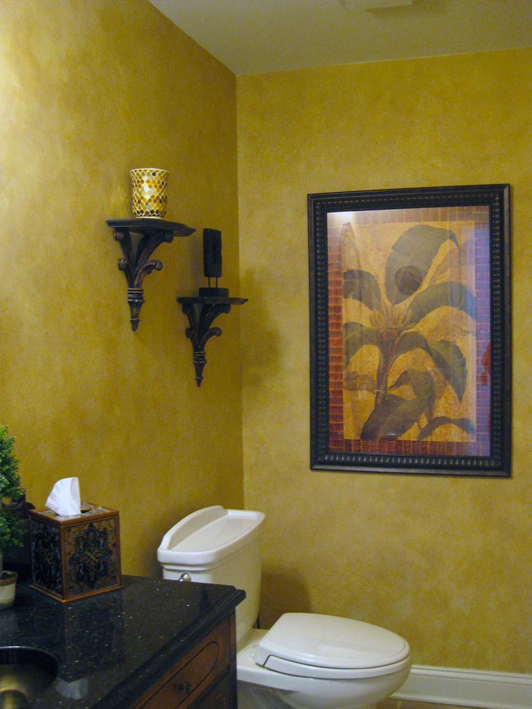 Textured plaster finish in lower level Family Room with color-wash over all.