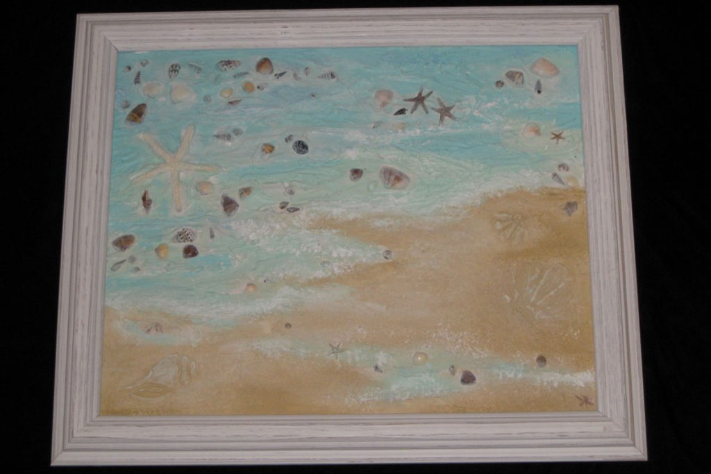 Texture medium used to create dimensional ocean scene with embedded seashells, finished with colored glazes, and framed.