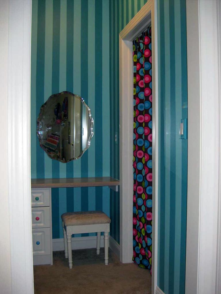 Bright shadow stripe painted in girl’s bedroom hallway.