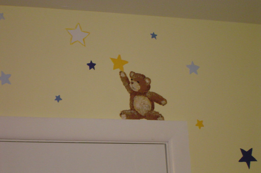 Painted teddy bear and stars