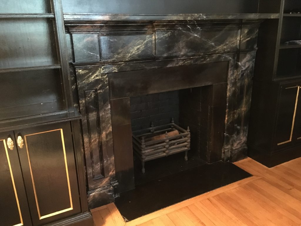 Faux black marble fireplace