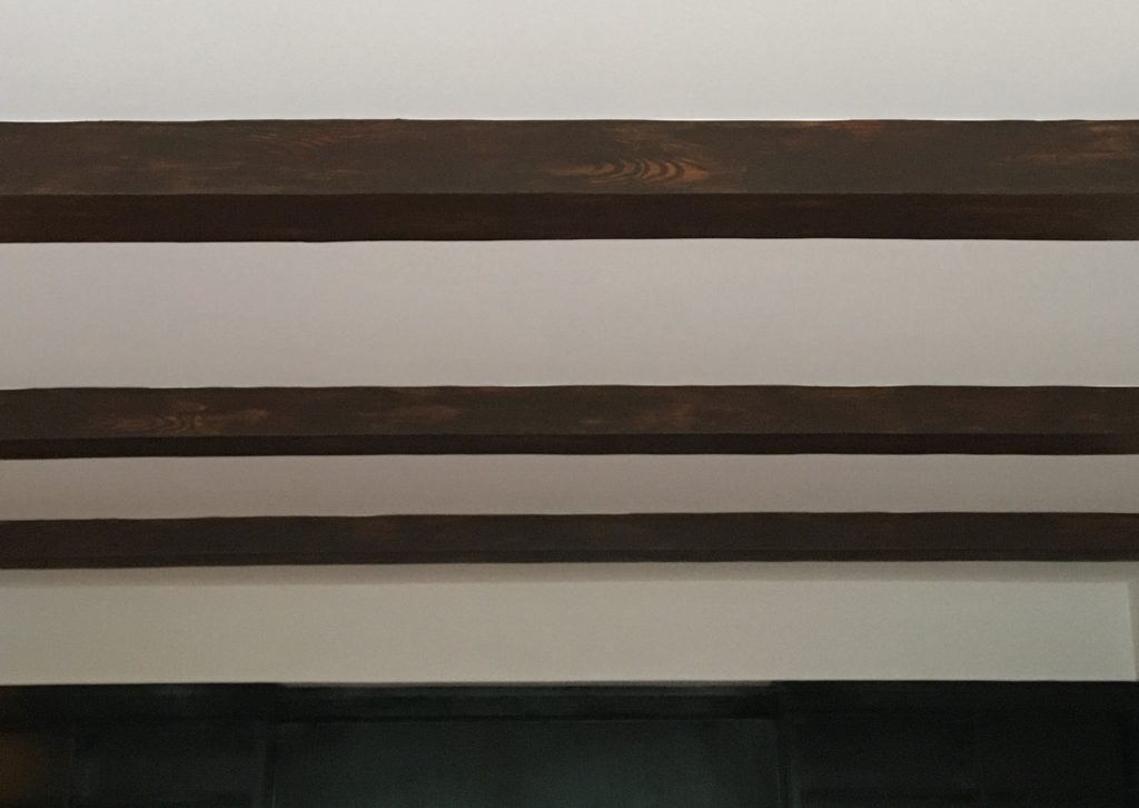 Faux wood ceiling beams