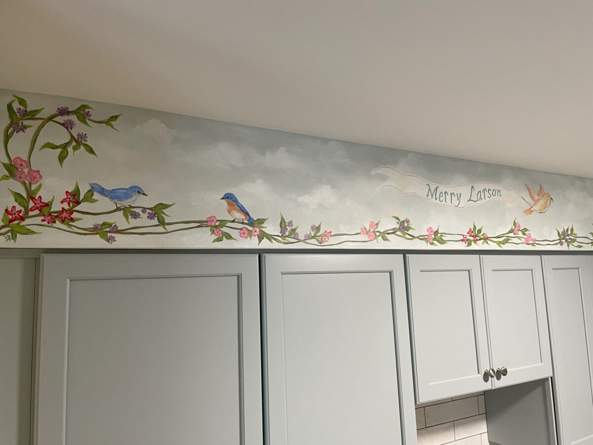 Kitchen soffit painted with birds and flowers
