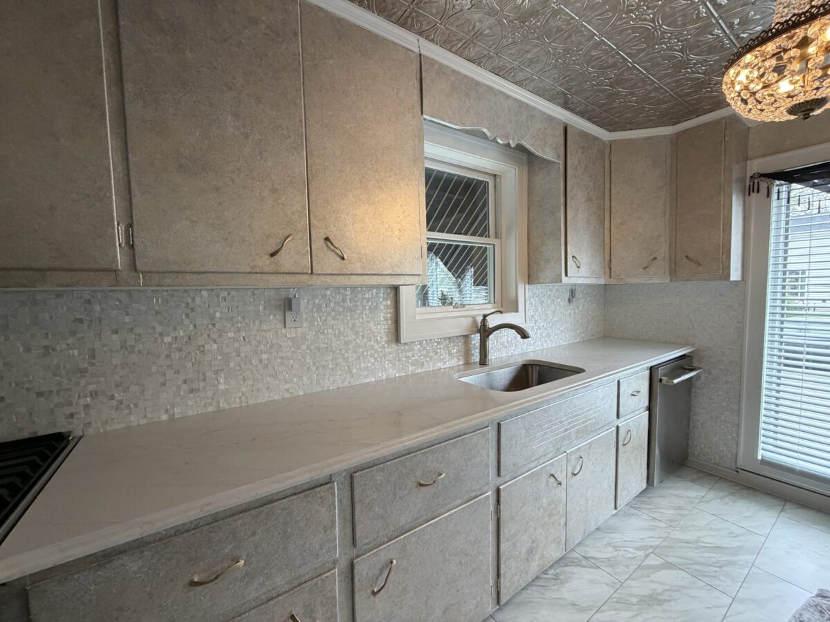 Kitchen cabinets refinished with shimmering Gold, Silver and metallic Pearl finish.